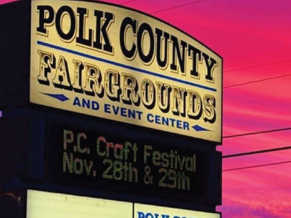 The Polk County Fairgrounds and Event Center marquee at sunset